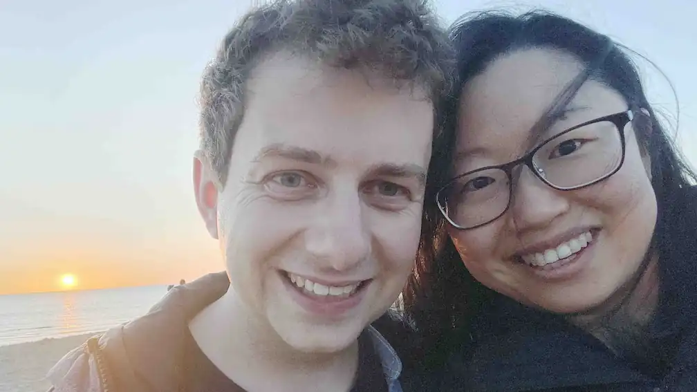 A photo of Mitch and his wife at sunset