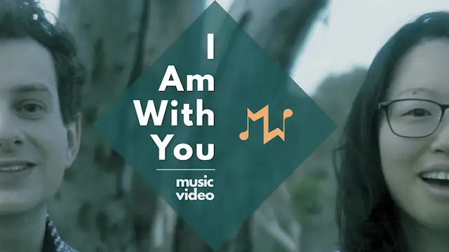 A youtube thumnail with a photo of Mitch and Jojo and the text 'I Am With You'